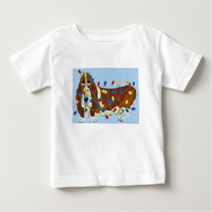 Camiseta Para Bebê Basset Hound Enroscado Em Luzes De Natal