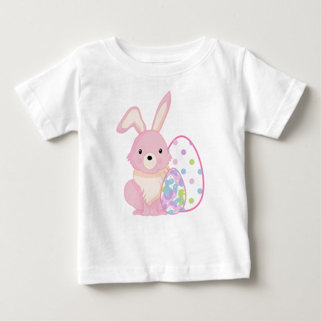 CAMISETA PARA BEBÊ CUTE PINK EASTER BUNNY WITH EASTER EGGS (Frente)