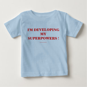 CAMISETA PARA BEBÊ ESTOU DESENVOLVENDO MEUS SUPERPORES!