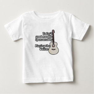 Camiseta Para Bebê O bom humor de hoje é patrocinado pela guitarra.
