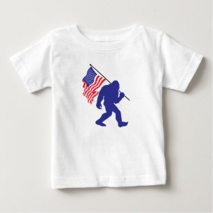 Camiseta Para Bebê Pé Grande Carregando da bandeira americana