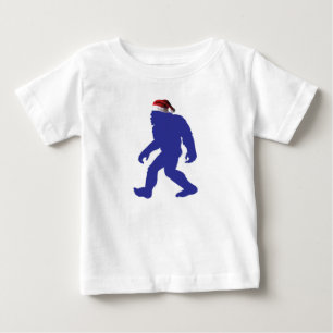 Camiseta Para Bebê Pé Grande vestindo um chapéu do Papai Noel