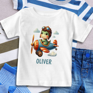 Camiseta Para Bebê Piloto Fofo Trex Dinossauro Voando um Avião Azul
