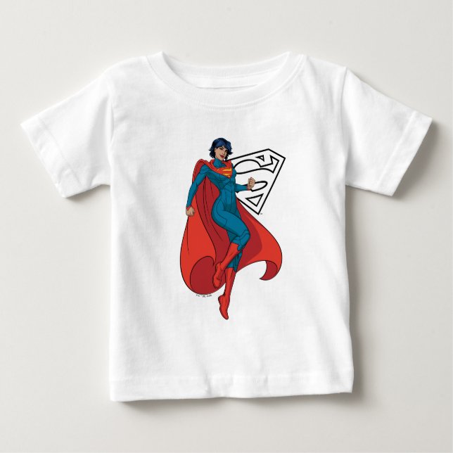 Camiseta Para Bebê Supergirl Hovering in Blue Suit (Frente)