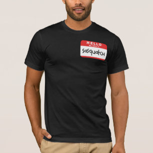Camiseta Paródia grande do pé do t-shirt do crachá