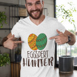 Camiseta Páscoa Pun Funny Eggspert Hunter Cotação Hilariy<br><div class="desc">Crianças adorariam esta camiseta branca de trocadilho de Páscoa com ovos coloridos,  dizendo "Caçador Eggspert". Faz um presente excelente para a família e os amigos.</div>