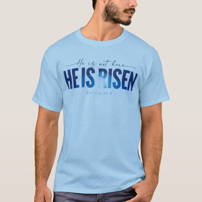 Camiseta Páscoa Resurrection Domingo: Ele Está Risen (Azul) (Frente)