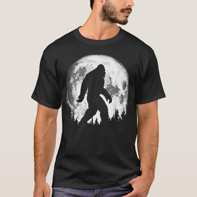 Camiseta Passeio Noturno do Pé-Grande Árvores Lua Cheia Leg (Frente)