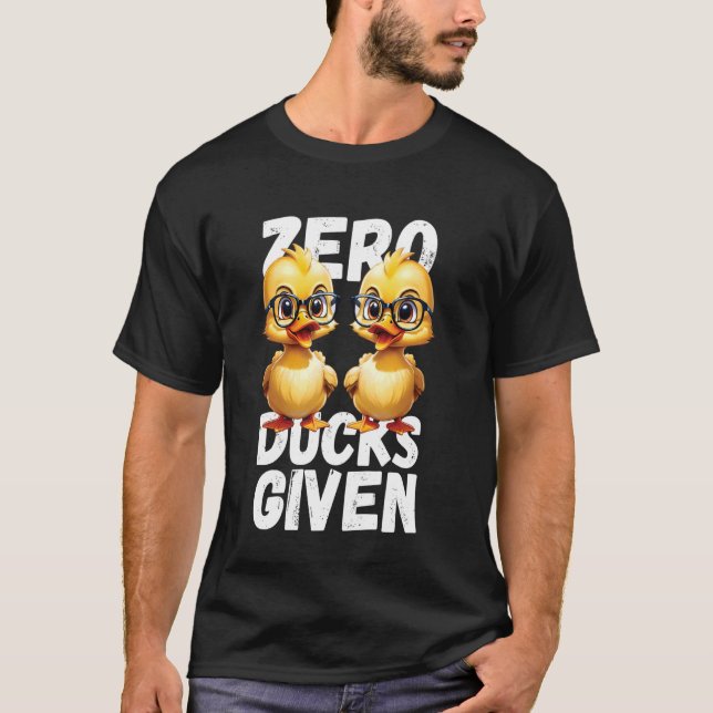 Camiseta Patos Zero Dão Design de Canhão Engraçado (Frente)