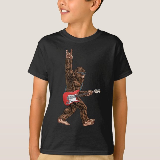 Camiseta Pé Grande Jogando Uma Pedra Elétrica De Violão Em  (Frente)