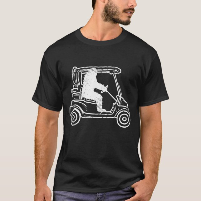 Camiseta Pé Grande Sasquatch Dirigindo Golfe Carrinho Engra (Frente)