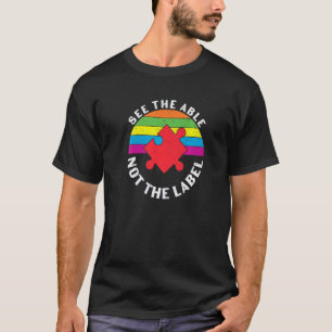 Camiseta peças quebra-cabeça coloridas Autismo Consciência