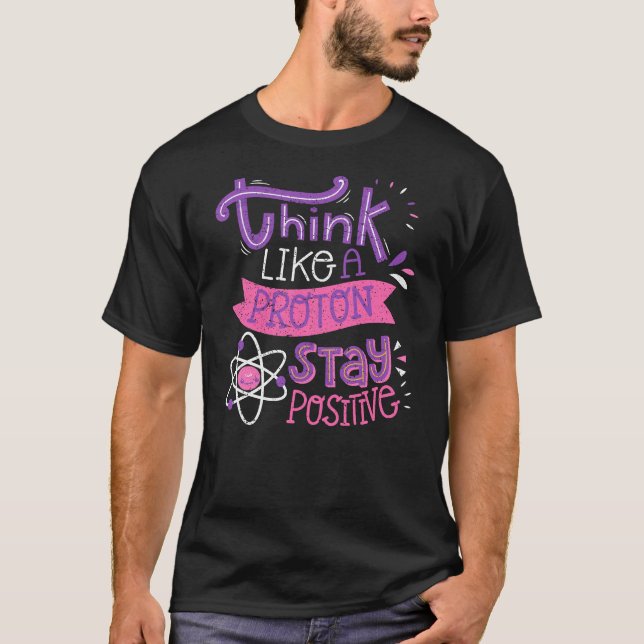 Camiseta Pense Como Um Próton Fique Positivo Nerd Fofo (Frente)