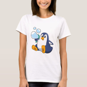 Camiseta Pinguim com bolhas de sabão.PNG
