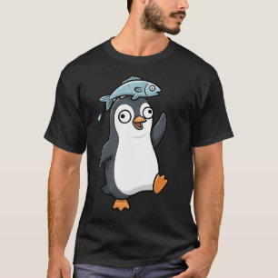 Camiseta Pinguim de desenho animado engraçado com peixe na