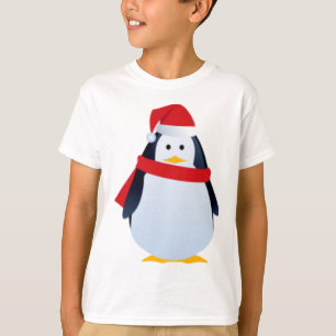 Camiseta Pinguim do Natal em um chapéu do papai noel