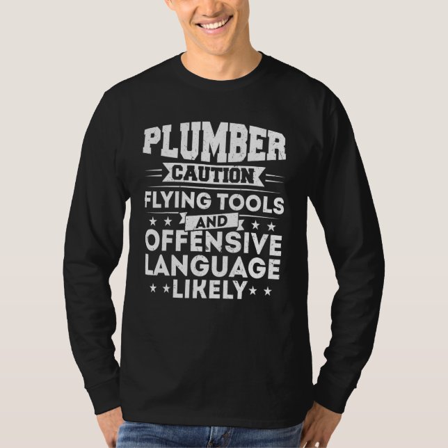Camiseta Plumber Caution Flying Tools And Offensive Languag (Frente)