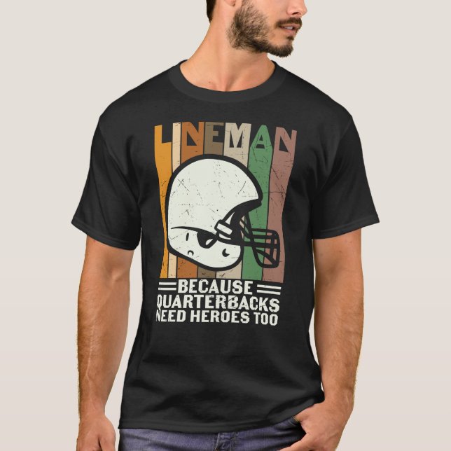 CAMISETA PORQUE QUARTERBACKS PRECISAM DE HERÓIS TAMBÉM (Frente)