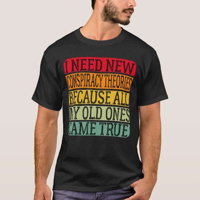 Camiseta Preciso De Novas Teorias Da Conspiração Porque As  (Frente)