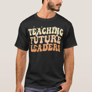 Camiseta Preto Melanina Dope Ensinando Futuros Líd