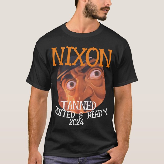 Camiseta Pronta e aninhado em Tanning NIXON 2024 Presidente (Frente)