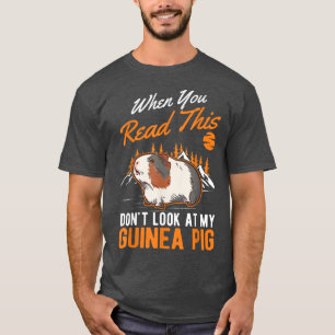 Camiseta Quando você lê isto Não olhe para a minha Guiné Pi