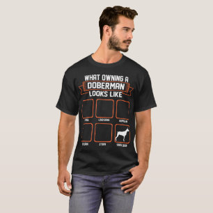 Camiseta Que cão possuindo do Doberman olha como a camiset