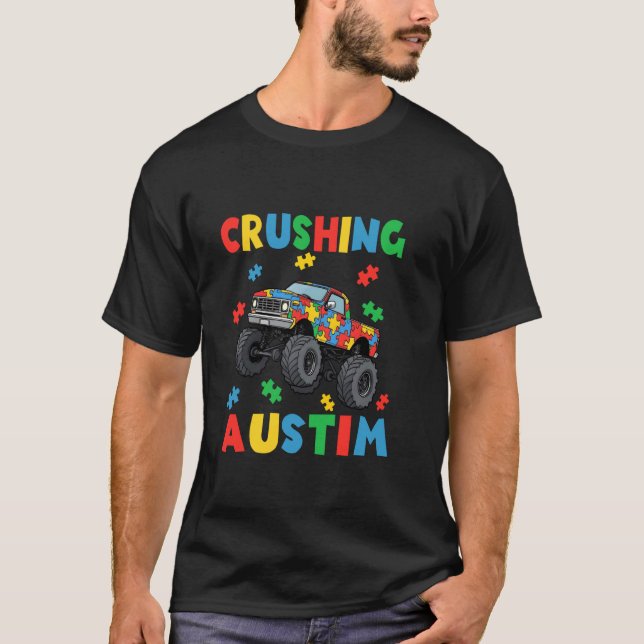 Camiseta Quebração de Autismo Caminhão Monstro Puzzles Cons (Frente)