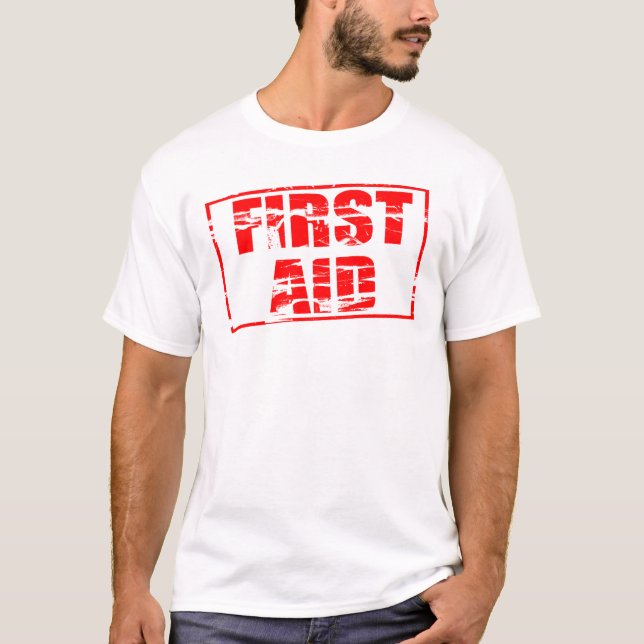 Camiseta Red rubber stamp effect. First Aid.  (Frente)