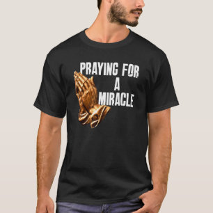 Camiseta Rezando Por Um Milagre Dizer Cristão Religioso
