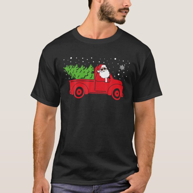 Camiseta Santa Claus Andando Caminhão Vermelho Mulheres de  (Frente)