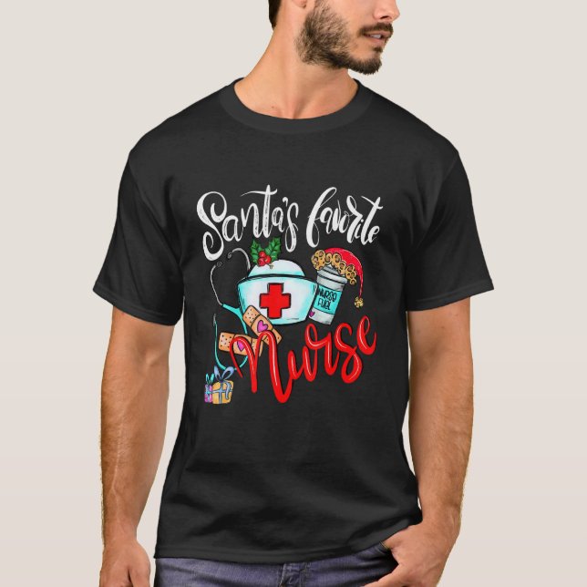 Camiseta Santas Favorite Nurse  Christmas Xmas RN CNA Nursi (Frente)