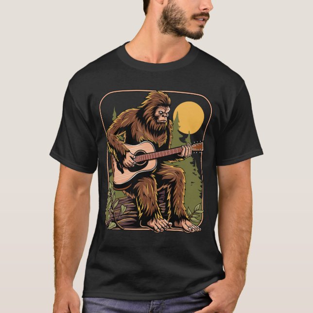 Camiseta Sasquatch Pé-Grande Retrorando Violão Acústico (Frente)