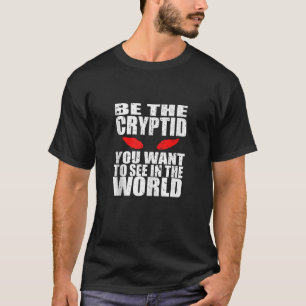 Camiseta Seja O Criptid Que Você Quer Ver No Distrito Mundi