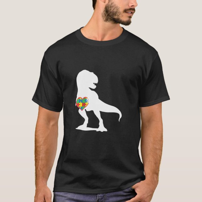 Camiseta Sensibilização Autismo Dinossauro T Rex Quebra-cab (Frente)