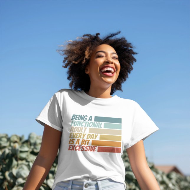Camiseta Ser Adulto Funcional Todo Dia Parece Excessivo (Being a Functional Adult Every Day Seems Excessive T-Shirt
by Ricaso. )