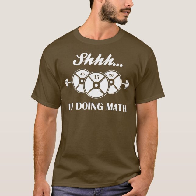 Camiseta Shhhhm Fazendo Pesos Matemáticos Levantando O Piso (Frente)