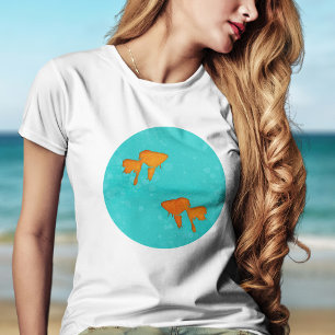 Camiseta Silhuetas de peixes dourados laranja em água turqu