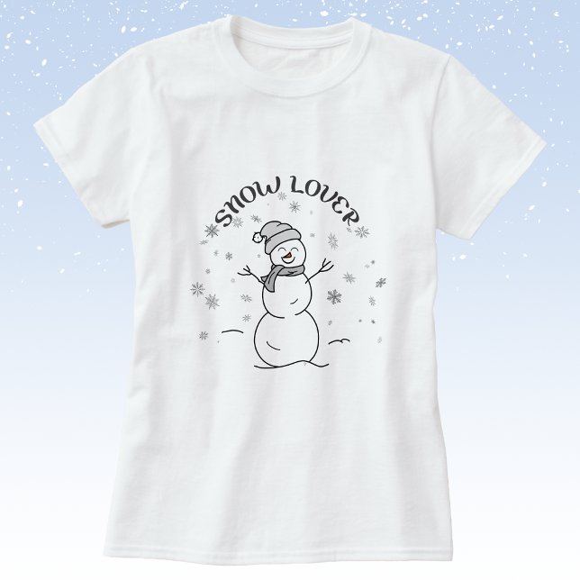 Camiseta   Snow Lover T-Shirt Cute Snowman Winter Graphic  (White T-Shirt with a Simple Drawing of a Cute Snowman Enjoying Falling Snow with "SNOW LOVER" Text.)