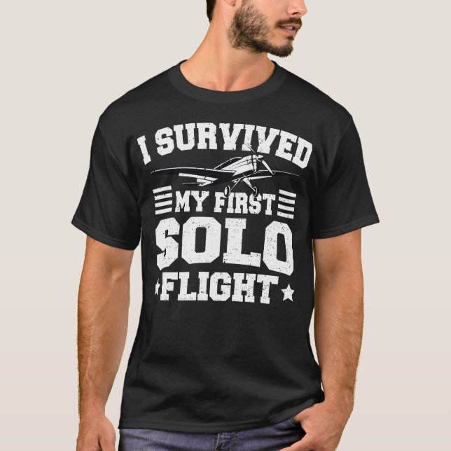 Camiseta Sobrevivi Ao Meu Primeiro Voo Solo - Piloto (Frente)