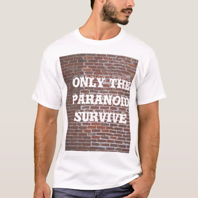 CAMISETA SOMENTE O PARANOID SOBREVIVE (Frente)