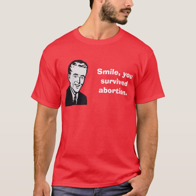 Camiseta Sorriso, você sobreviveu ao aborto (Frente)