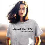 Camiseta Suporte indesculpável: "1-800-HIS-PERDA"<br><div class="desc">Reuna o seu esquadrão de apoio com a nossa camiseta "1-800-HIS-LOSS", uma declaração ousada de solidariedade e capacitação. Apresentando uma tipografia elegante em preto flagrante contra um pano de fundo de cinzas solidárias (a cor pode ser personalizada), esta camisa envia uma mensagem clara de apoio e camaradagem. Quer esteja levantando...</div>