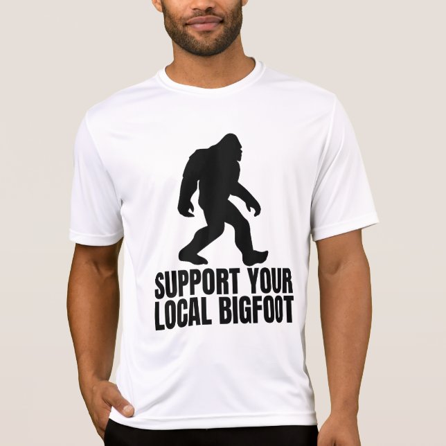 Camiseta Suportem O Seu Pé-Grande Engraçado Local (Frente)