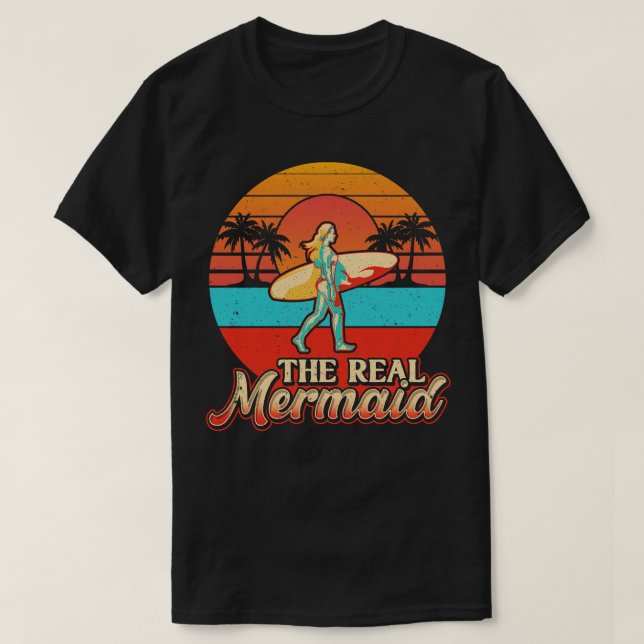 Camiseta Surfista Engraçada Sereia Real Dona de Surfe Mulhe (Frente do Design)