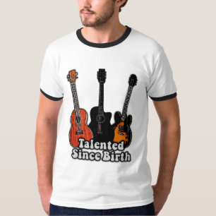 Camiseta Talentoso desde o nascimento. Guitarras coloridas 