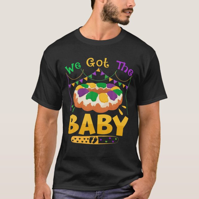 Camiseta Temos O Anúncio De Gravidez Do Bebê Mardi Gras. (Frente)
