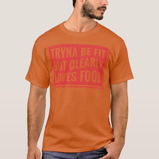 Camiseta Tentando estar em forma, mas claramente ama comida (Frente)