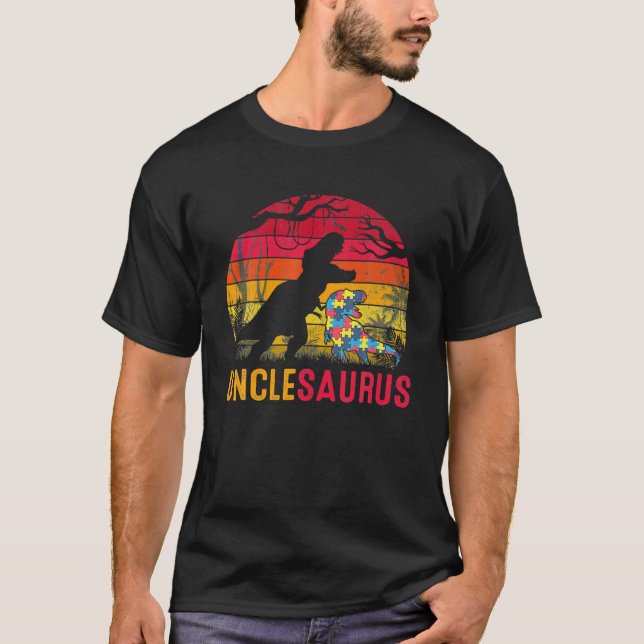 Camiseta Tio Saurus Rex Autismo Sensibilização Dinossauro E (Frente)