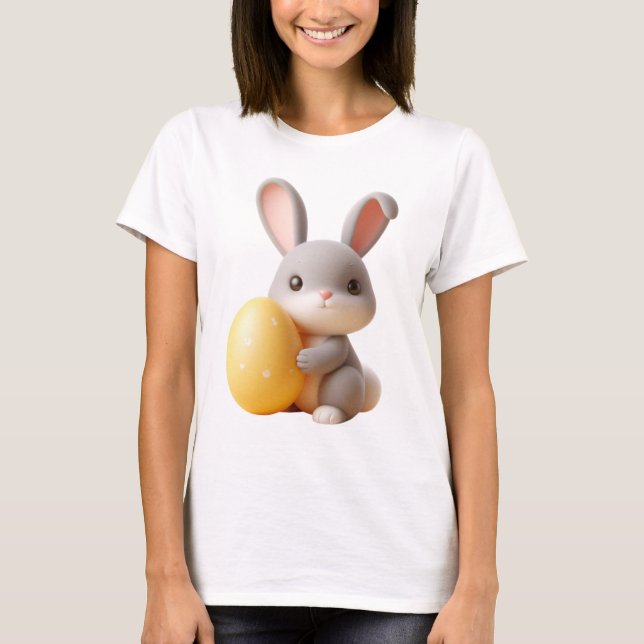 Camiseta Título: Coelhinho da Páscoa 3D Segurando um Ovo Vi (Frente)